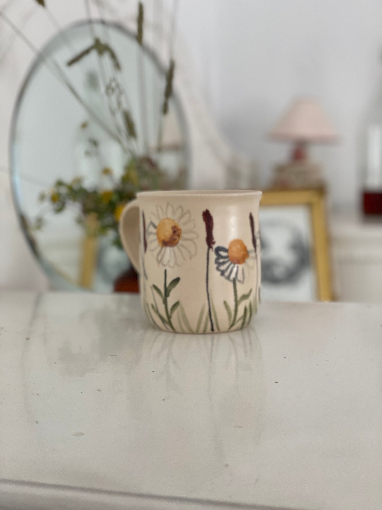 Krūzite ar margrietiņām