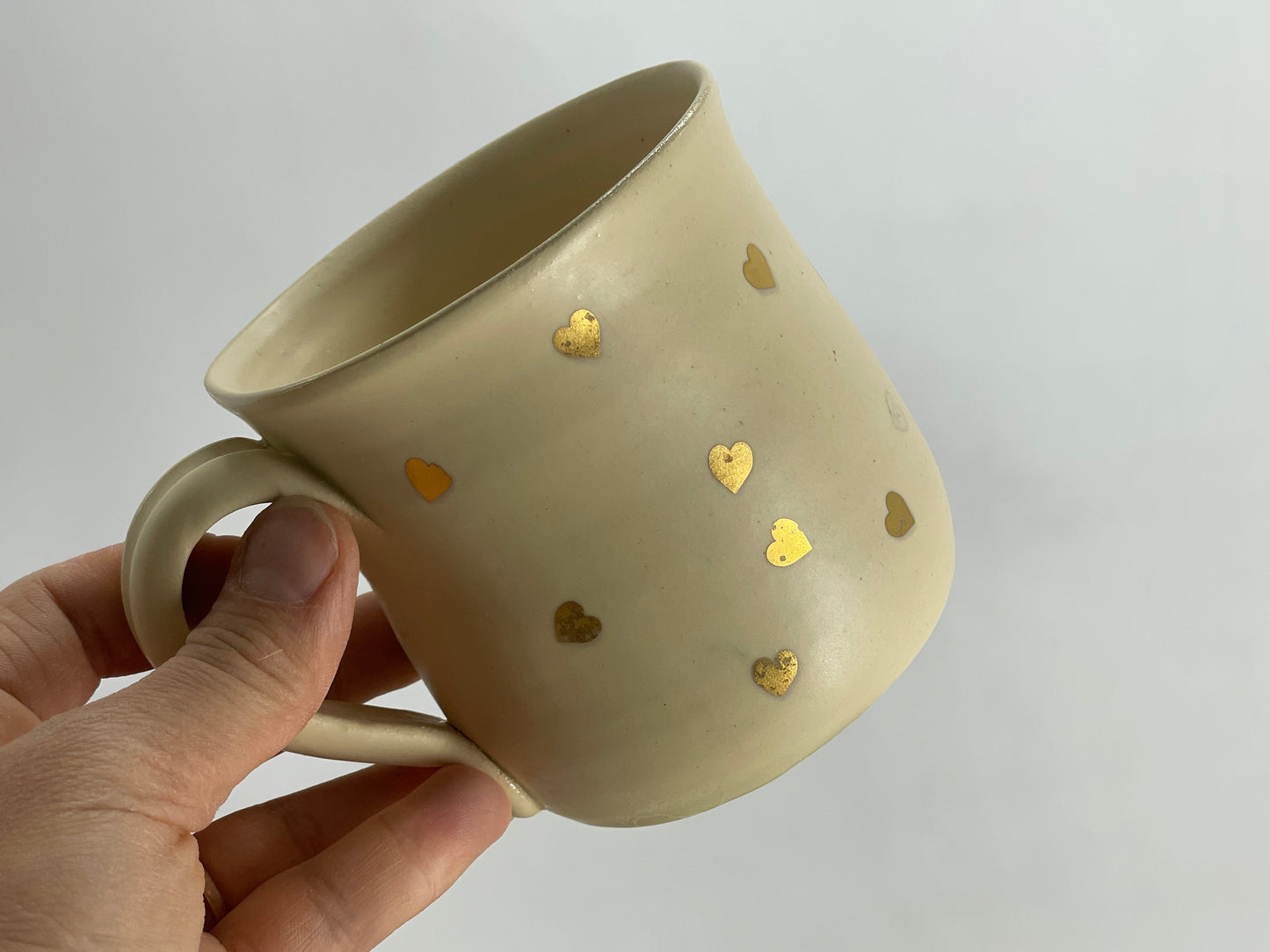 Zelta sirsniņu krūze