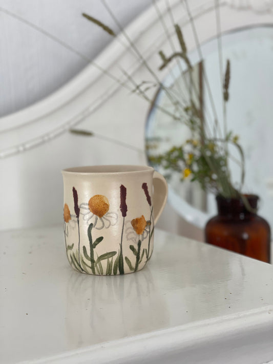 Krūzite ar margrietiņām