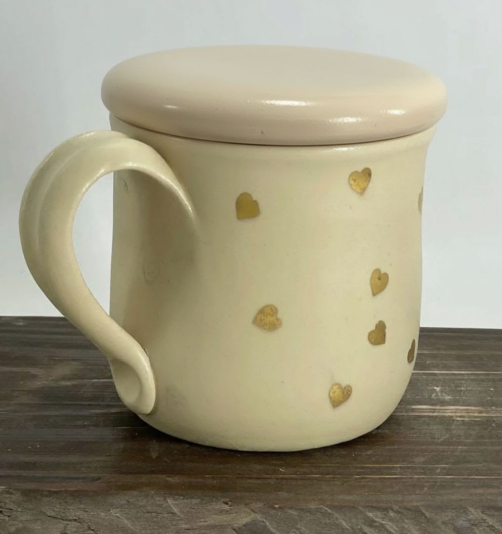 Zelta sirsniņu krūze