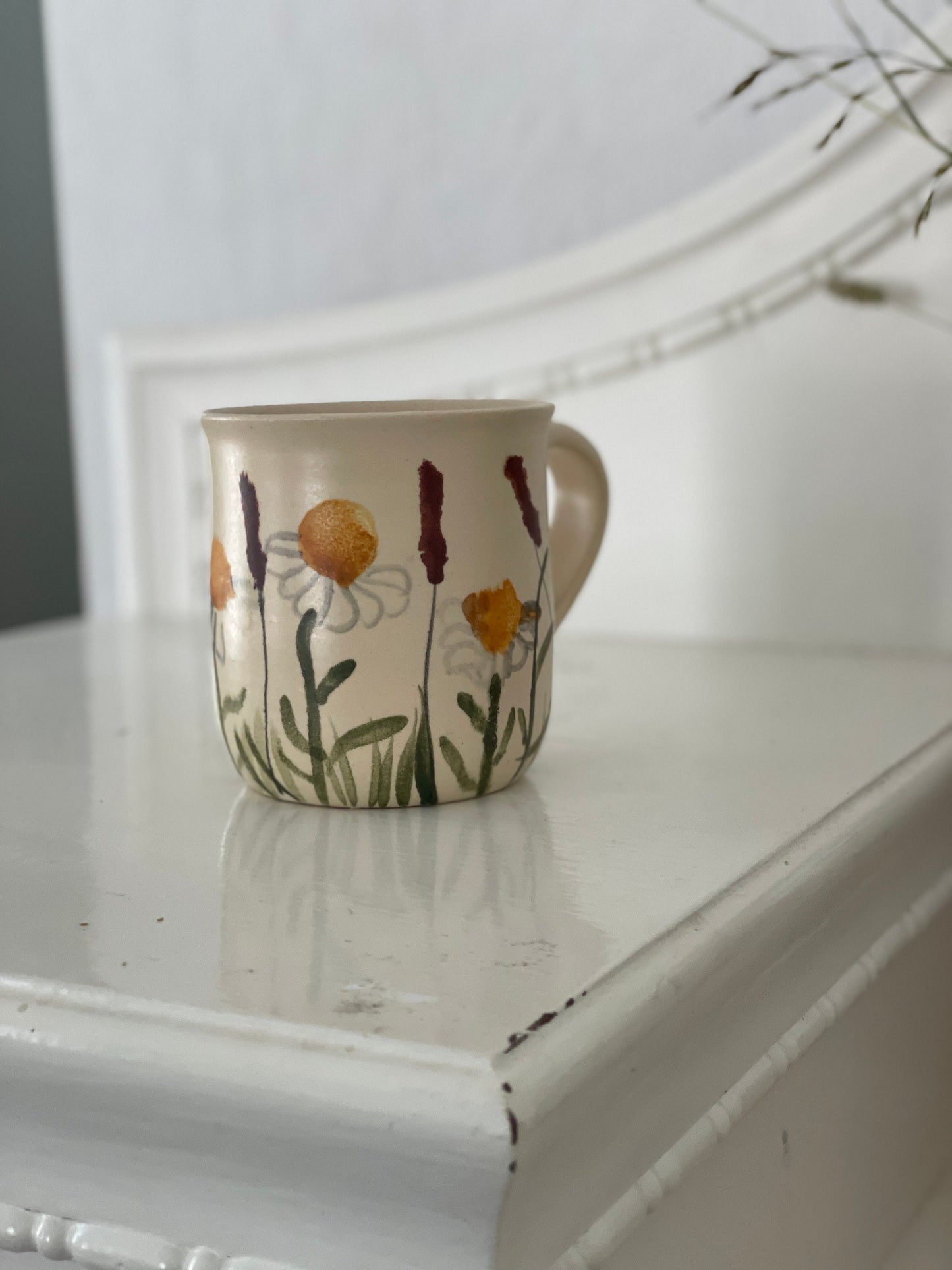 Krūzite ar margrietiņām