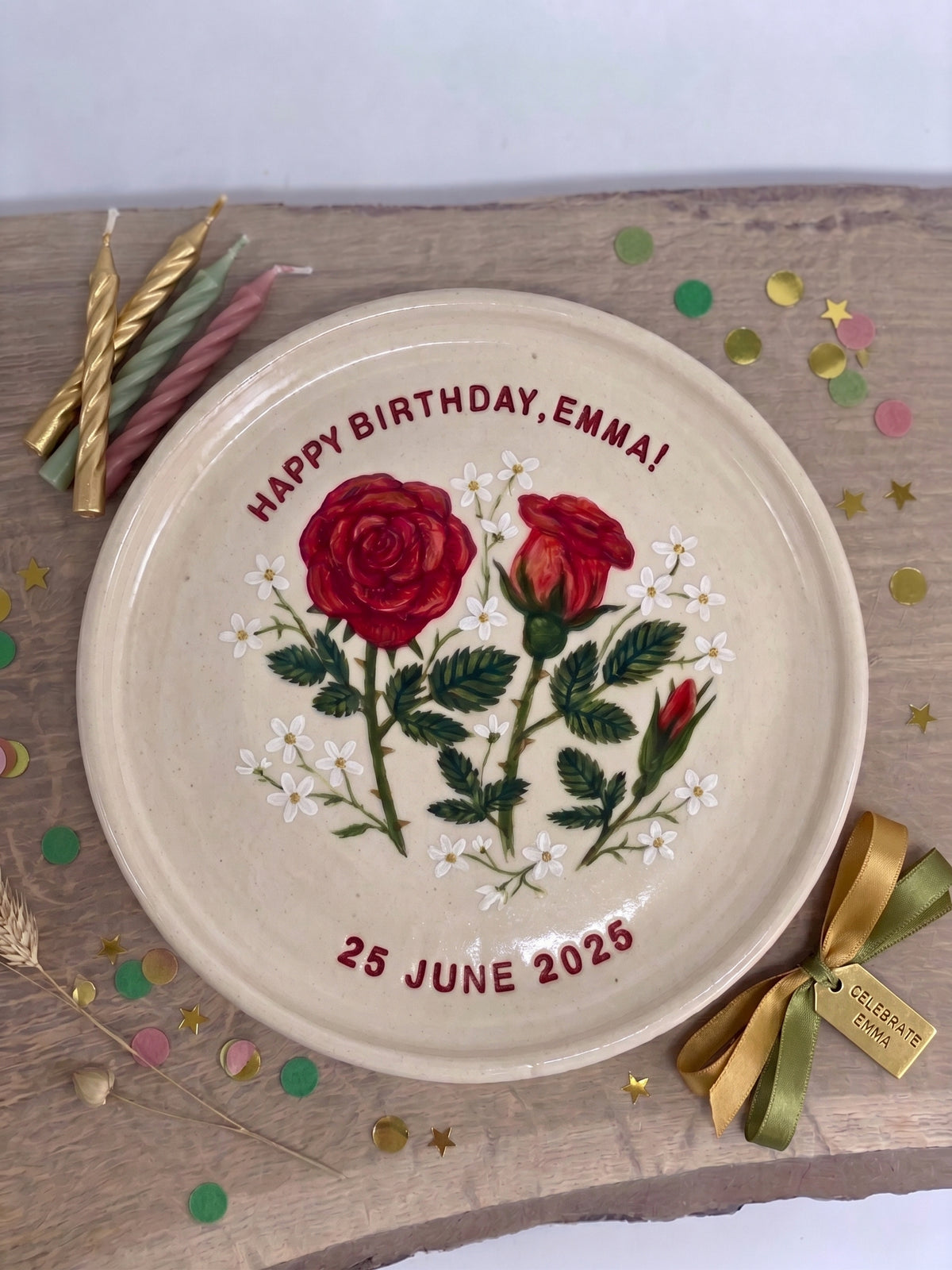 A hand-painted ceramic happy birthday plate