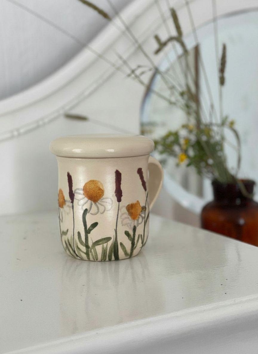 Krūzite ar margrietiņām