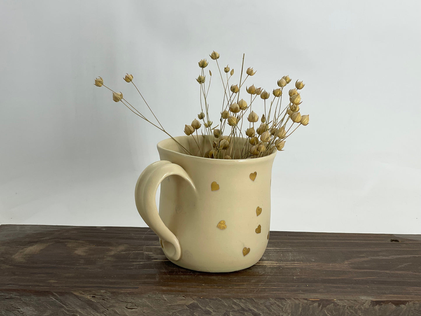 Zelta sirsniņu krūze