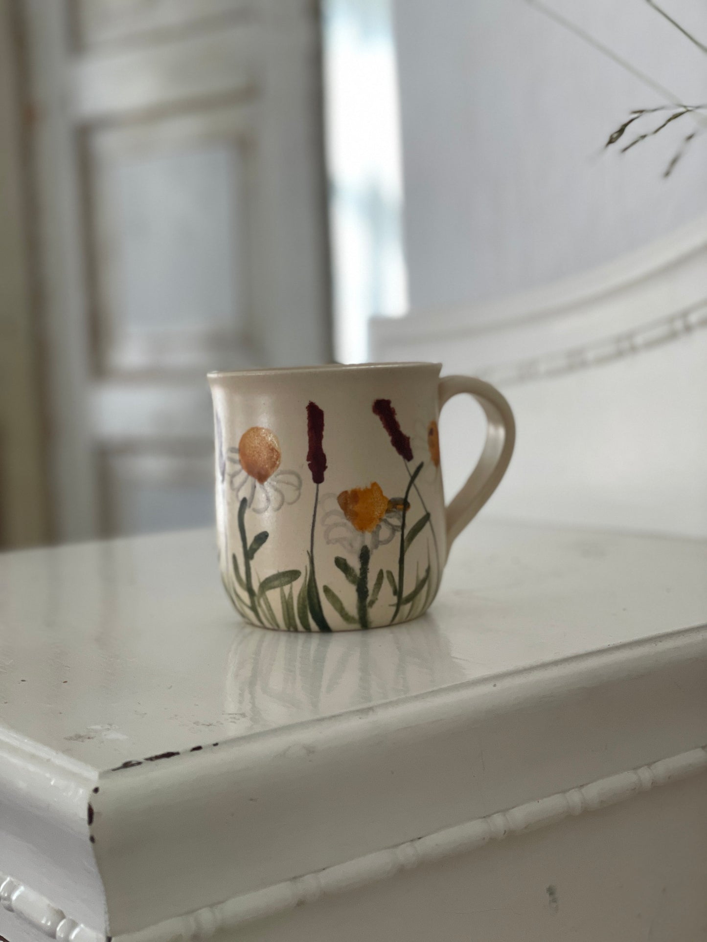 Krūzite ar margrietiņām